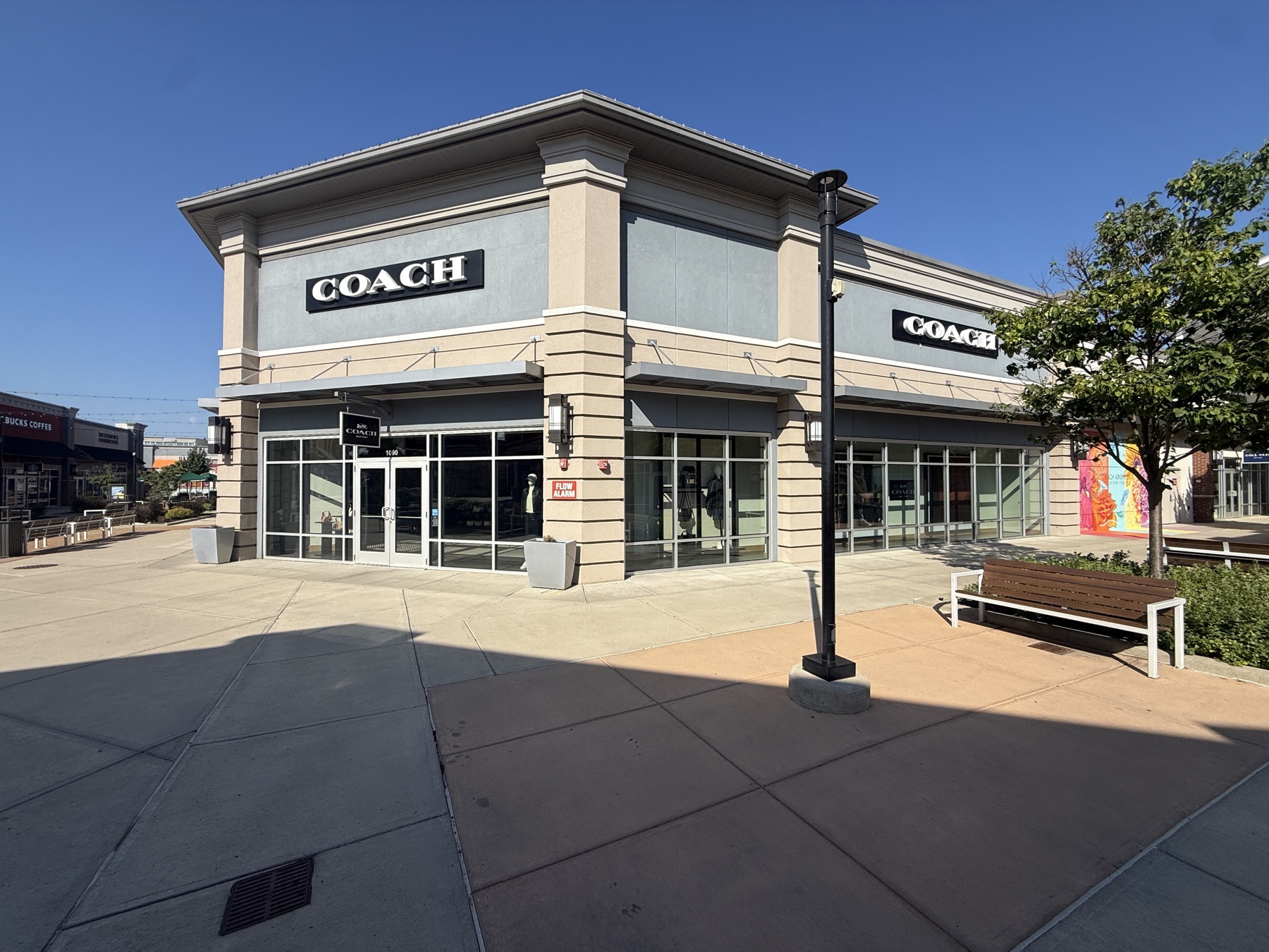 Exterior dimensional letter signage installed over a retail storefront
